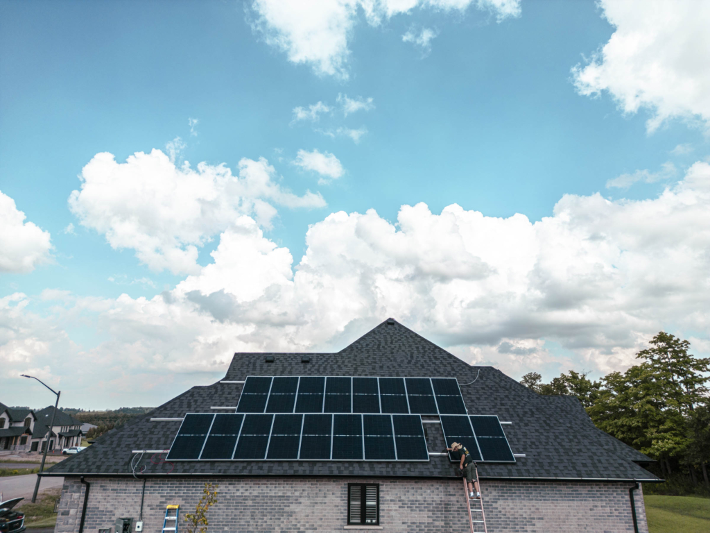 Aerial drone view of residential solar panel installation in Ontario